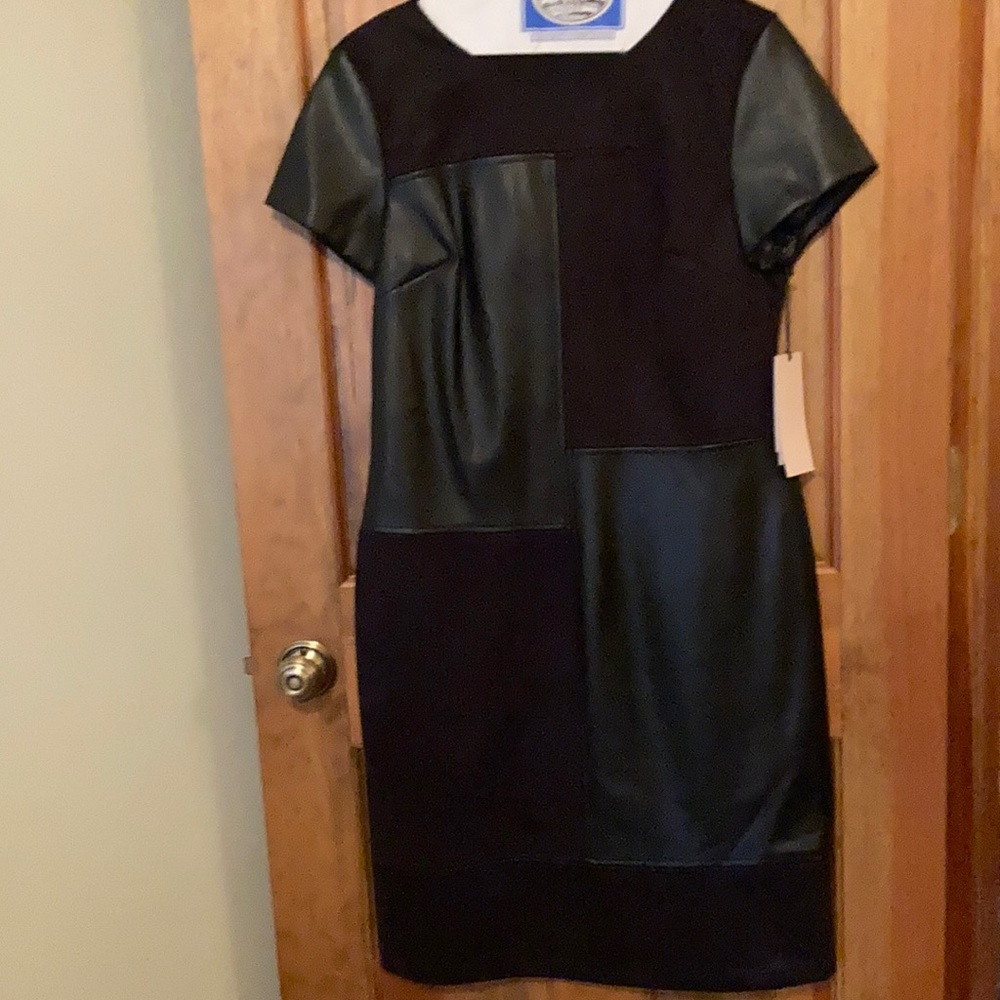 Sexy black suede and leather patchwork patterned dress in black.